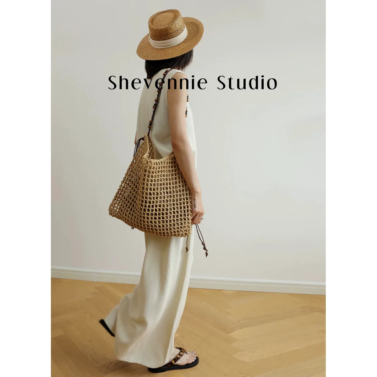 Handwoven Beach Straw Hat 14 Handwoven Beach Straw Hat 14 made with natural raffia and woven straw for summer resort collections