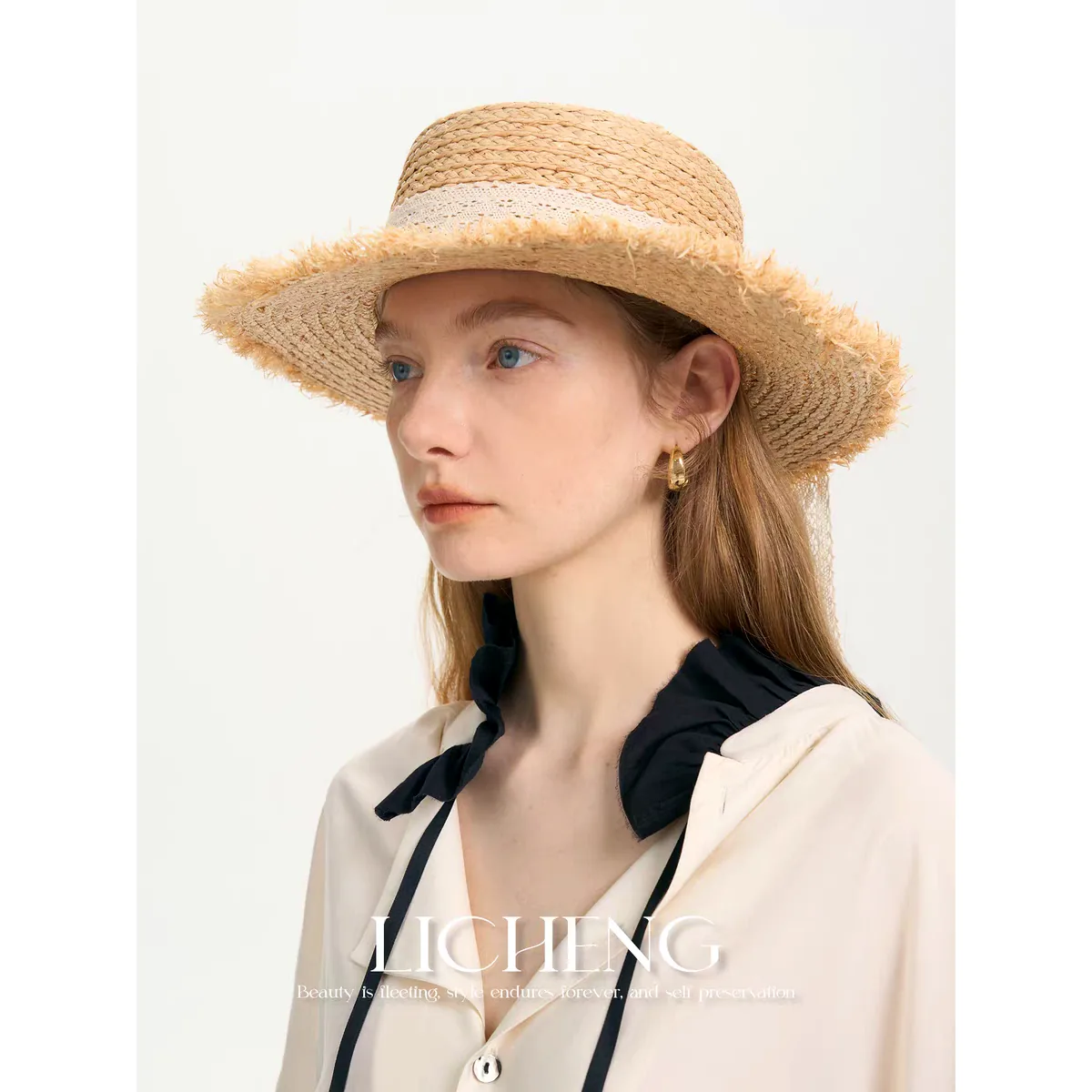 Wide Brim Summer Straw Hat 26 Wide Brim Summer Straw Hat 26 made with natural raffia and woven straw for summer resort collections