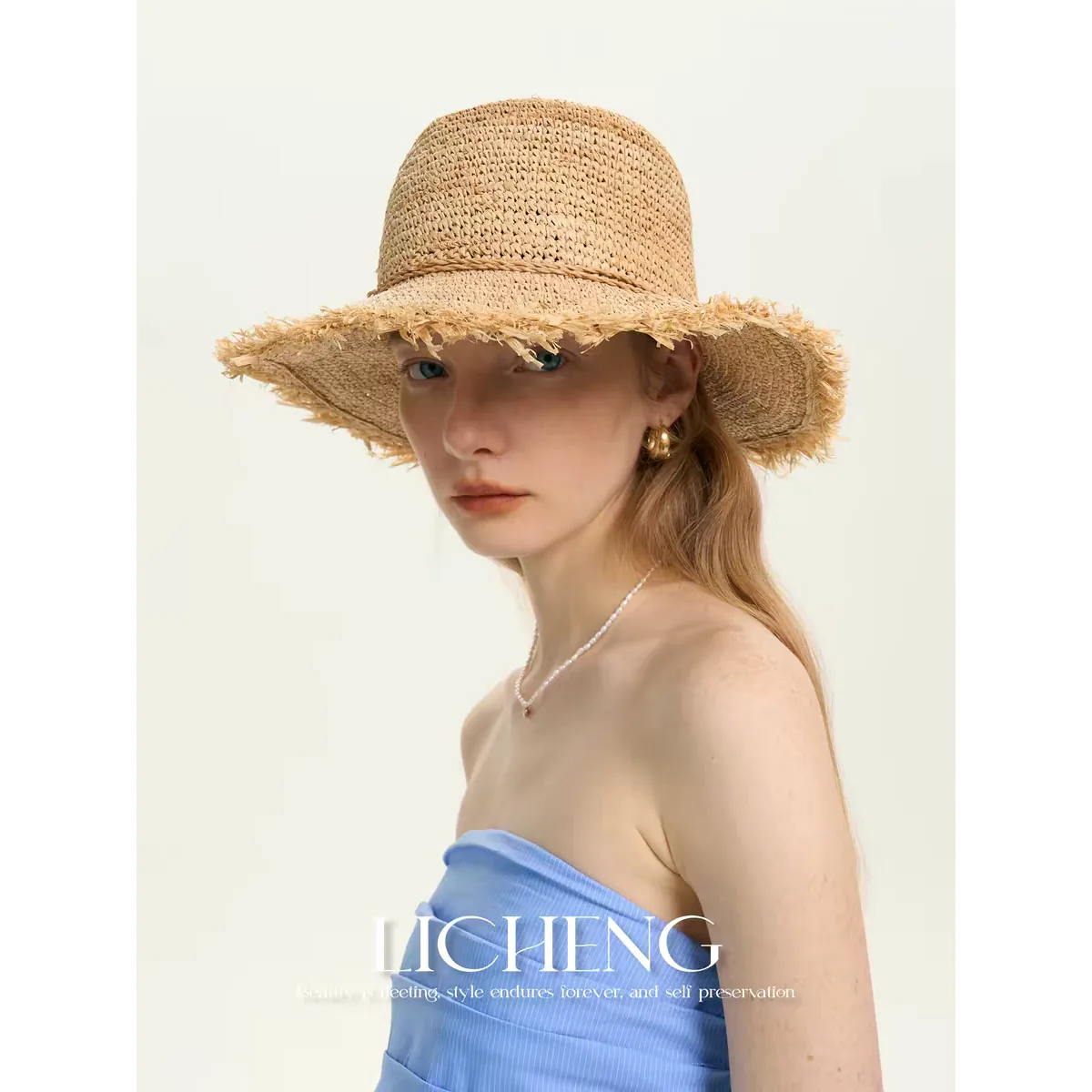 Packable Vacation Straw Hat 29 Packable Vacation Straw Hat 29 made with natural raffia and woven straw for summer resort collections