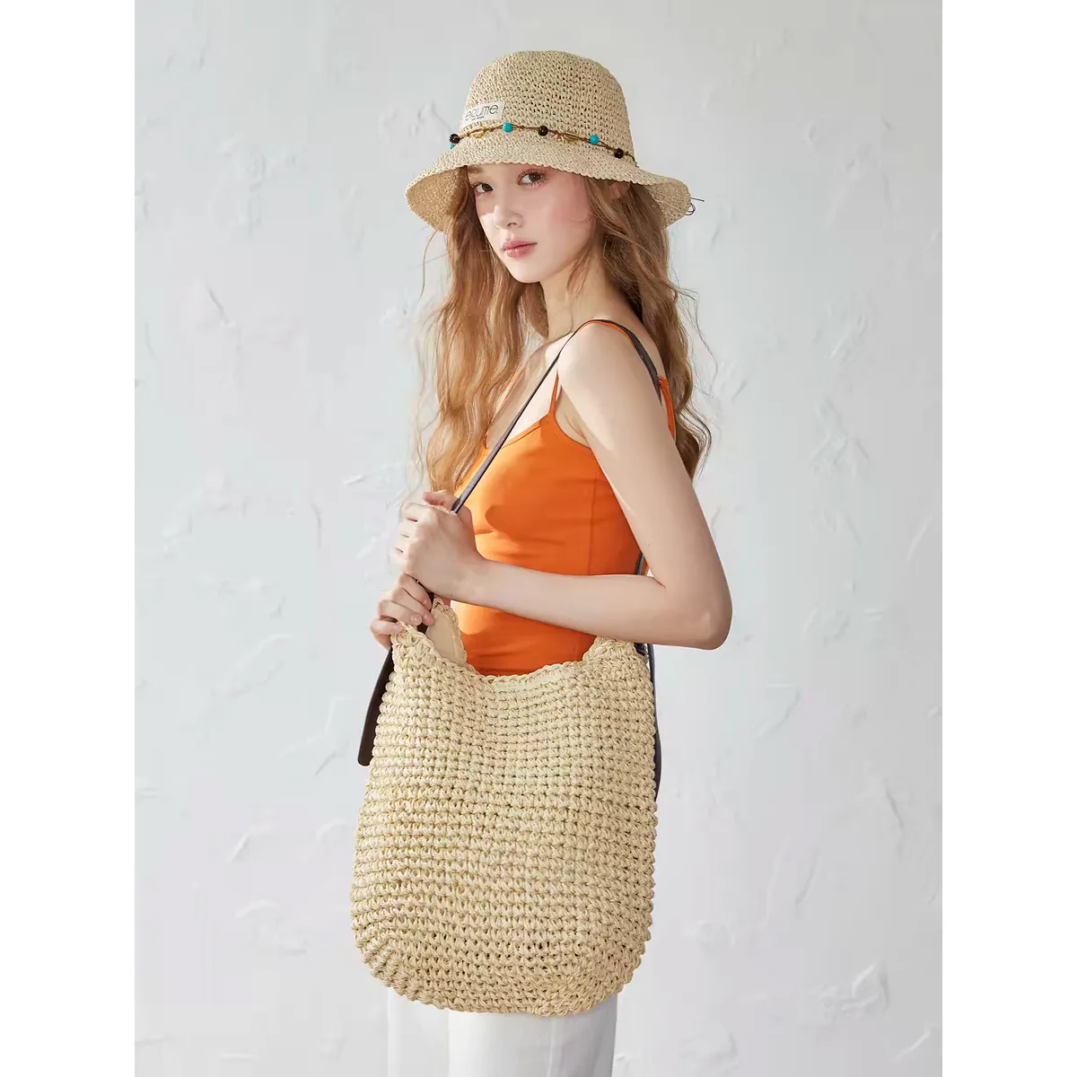 Ribbon Trim Raffia Hat 35 Ribbon Trim Raffia Hat 35 made with natural raffia and woven straw for summer resort collections