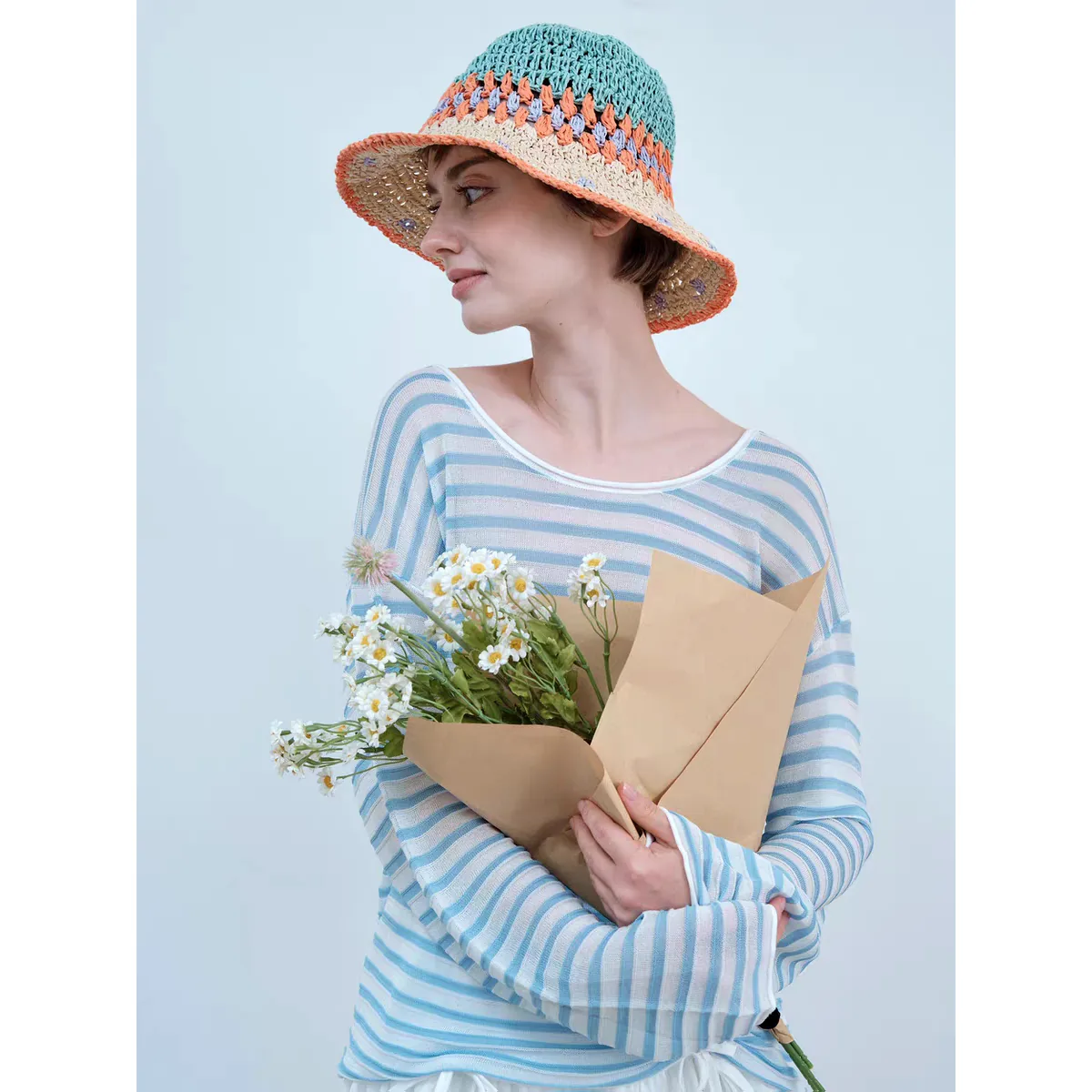 Resort Style Straw Hat 40 Resort Style Straw Hat 40 made with natural raffia and woven straw for summer resort collections