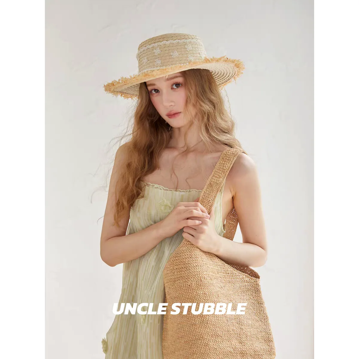 Natural Raffia Straw Hat 49 Natural Raffia Straw Hat 49 made with natural raffia and woven straw for summer resort collections