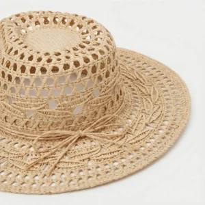 Natural Raffia Straw Hat 65 made with natural raffia and woven straw for summer resort collections