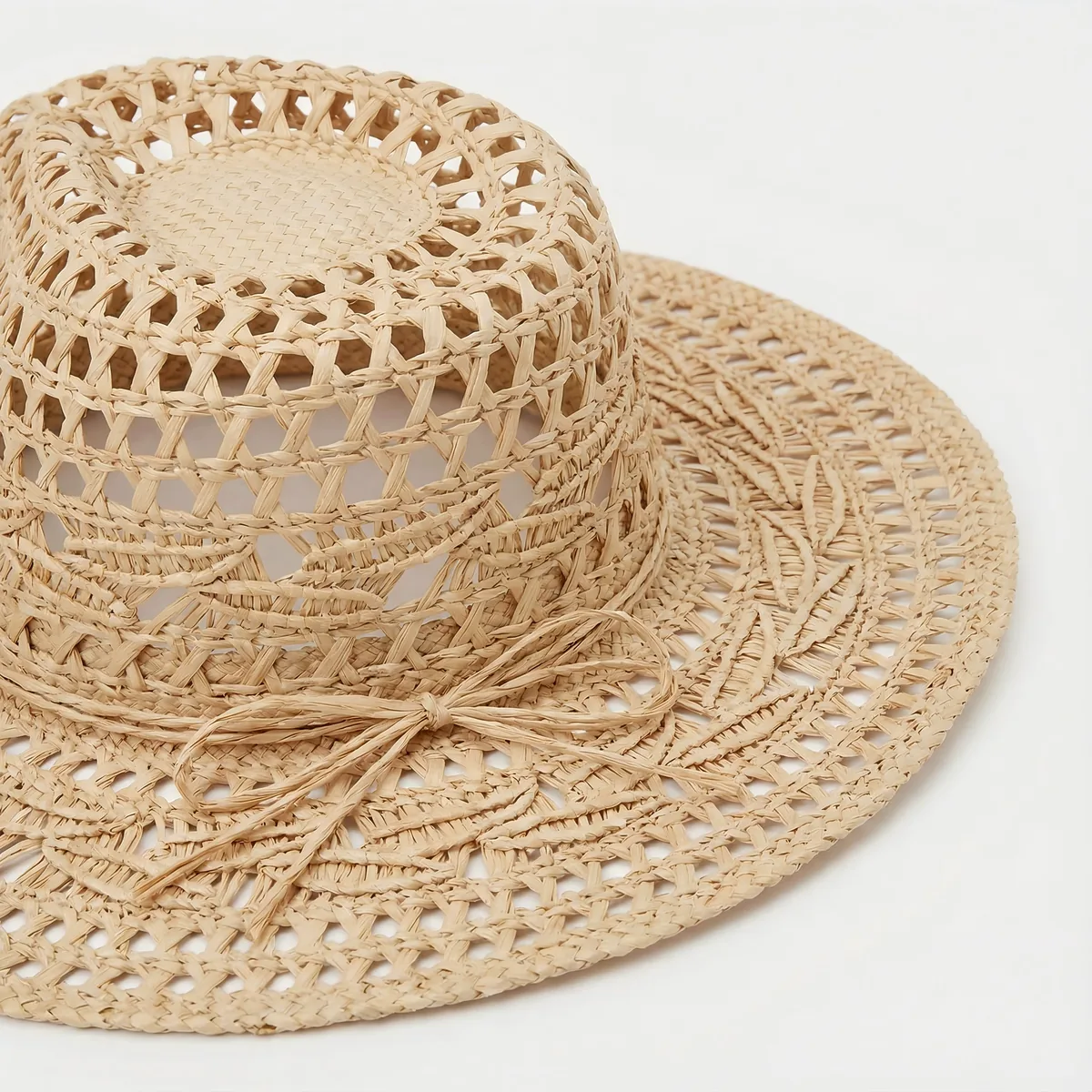 Natural Raffia Straw Hat 65 Natural Raffia Straw Hat 65 made with natural raffia and woven straw for summer resort collections
