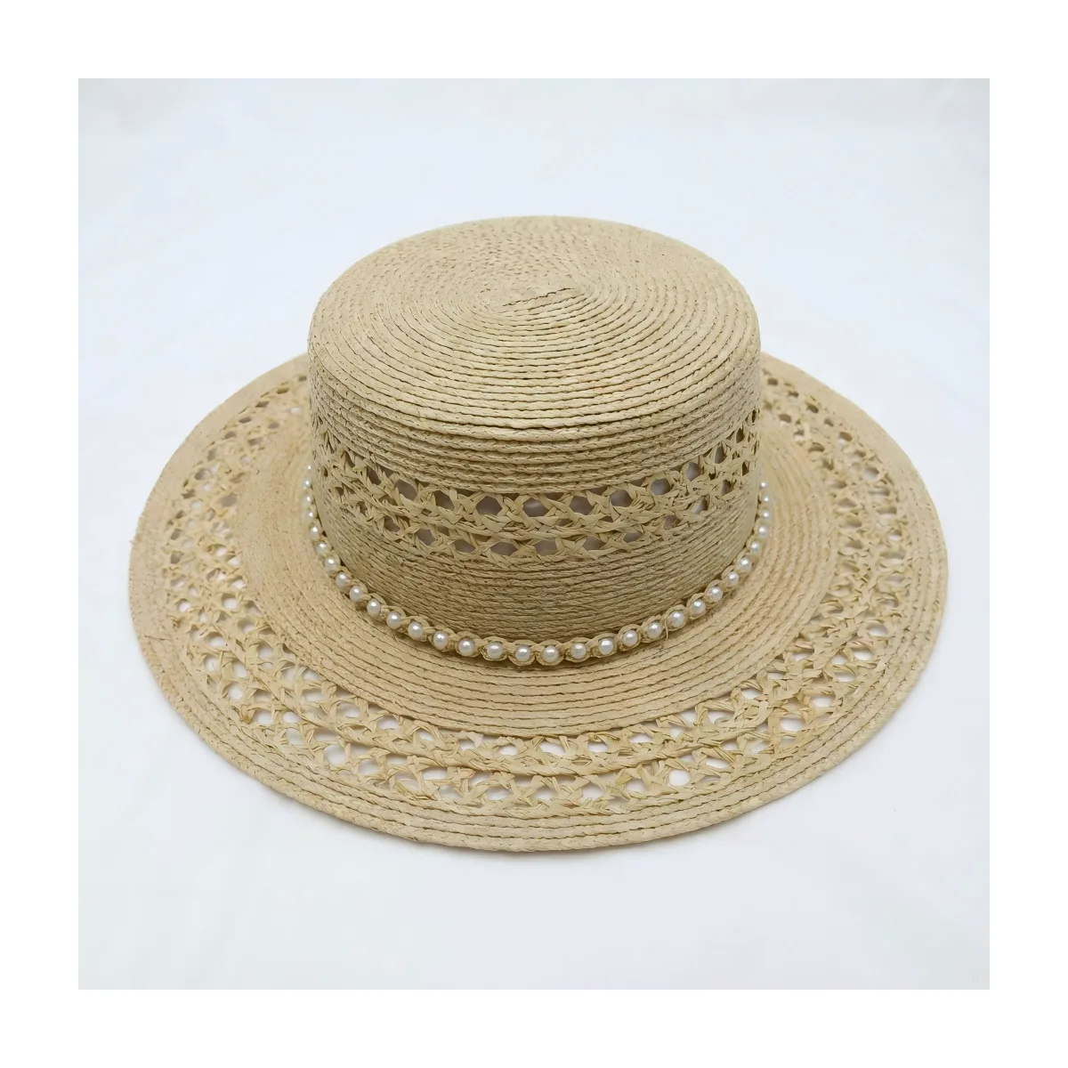 Resort Style Straw Hat 96 Resort Style Straw Hat 96 made with natural raffia and woven straw for summer resort collections